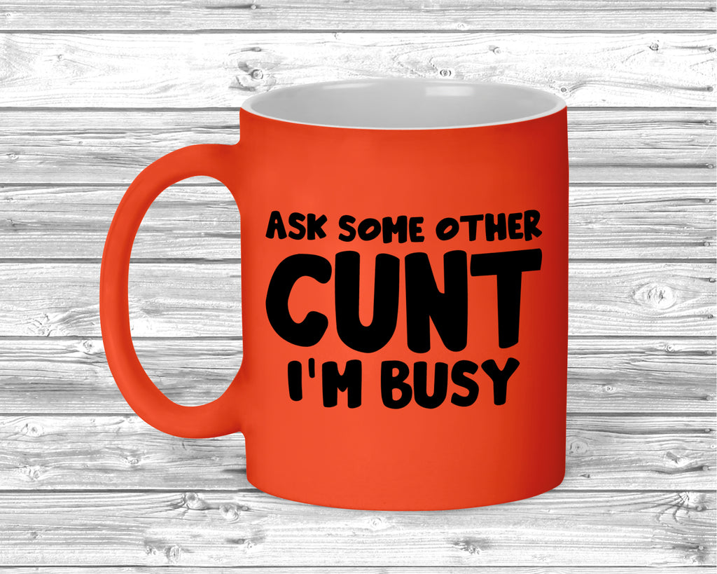 Funny rude slogan mug with fluorescent finish on ceramic coffee cup.