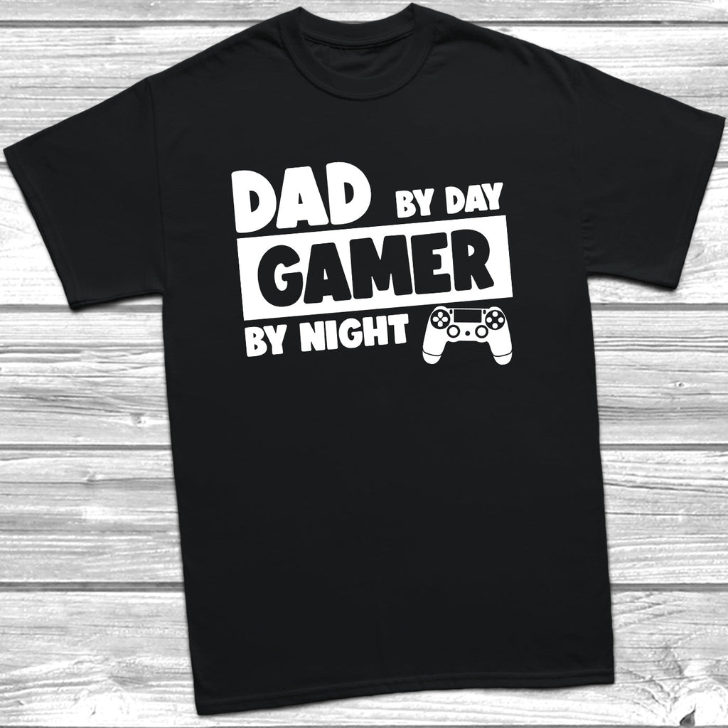 Get trendy with Dad By Day Gamer By Night T-Shirt - T-Shirt available at DizzyKitten. Grab yours for £9.49 today!