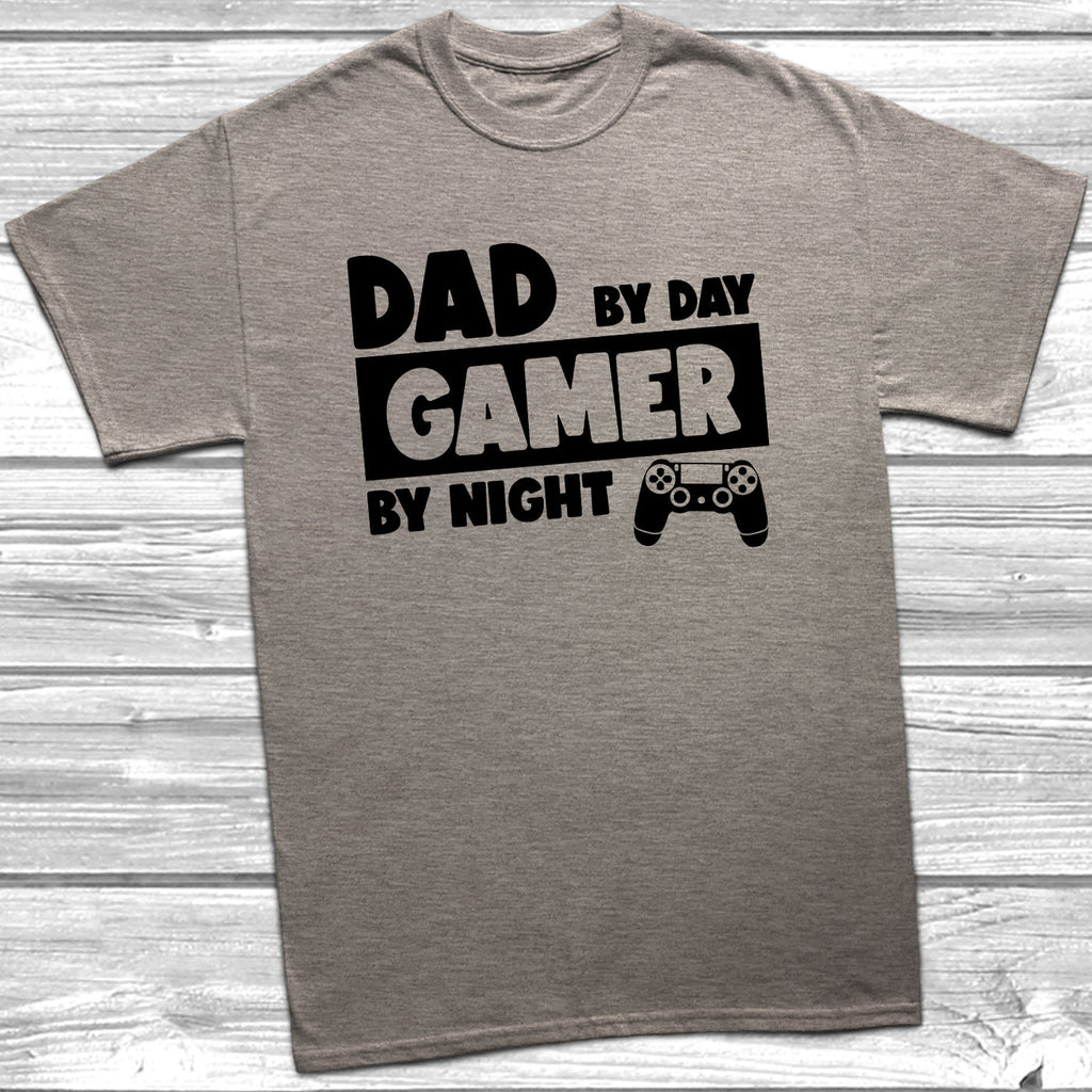 Get trendy with Dad By Day Gamer By Night T-Shirt - T-Shirt available at DizzyKitten. Grab yours for £9.99 today!