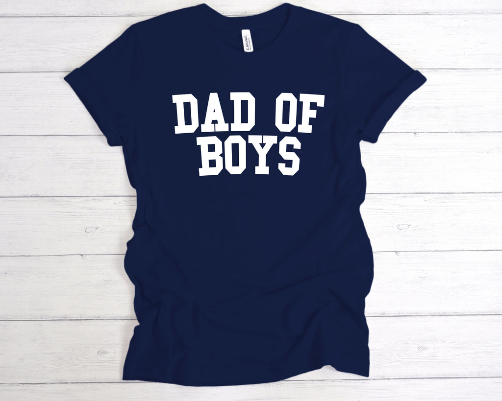 Deep Navy cotton unisex t-shirt featuring the bold slogan "Dad of Boys" printed across the chest. This funny Father’s Day shirt is a perfect gift from sons, celebrating proud dads of boys with a soft, comfortable fit and durable print. Ideal for boy dads who embrace the fun, messy, and rewarding side of fatherhood. Great for gifting on Father’s Day, birthdays, or as a surprise from the kids.