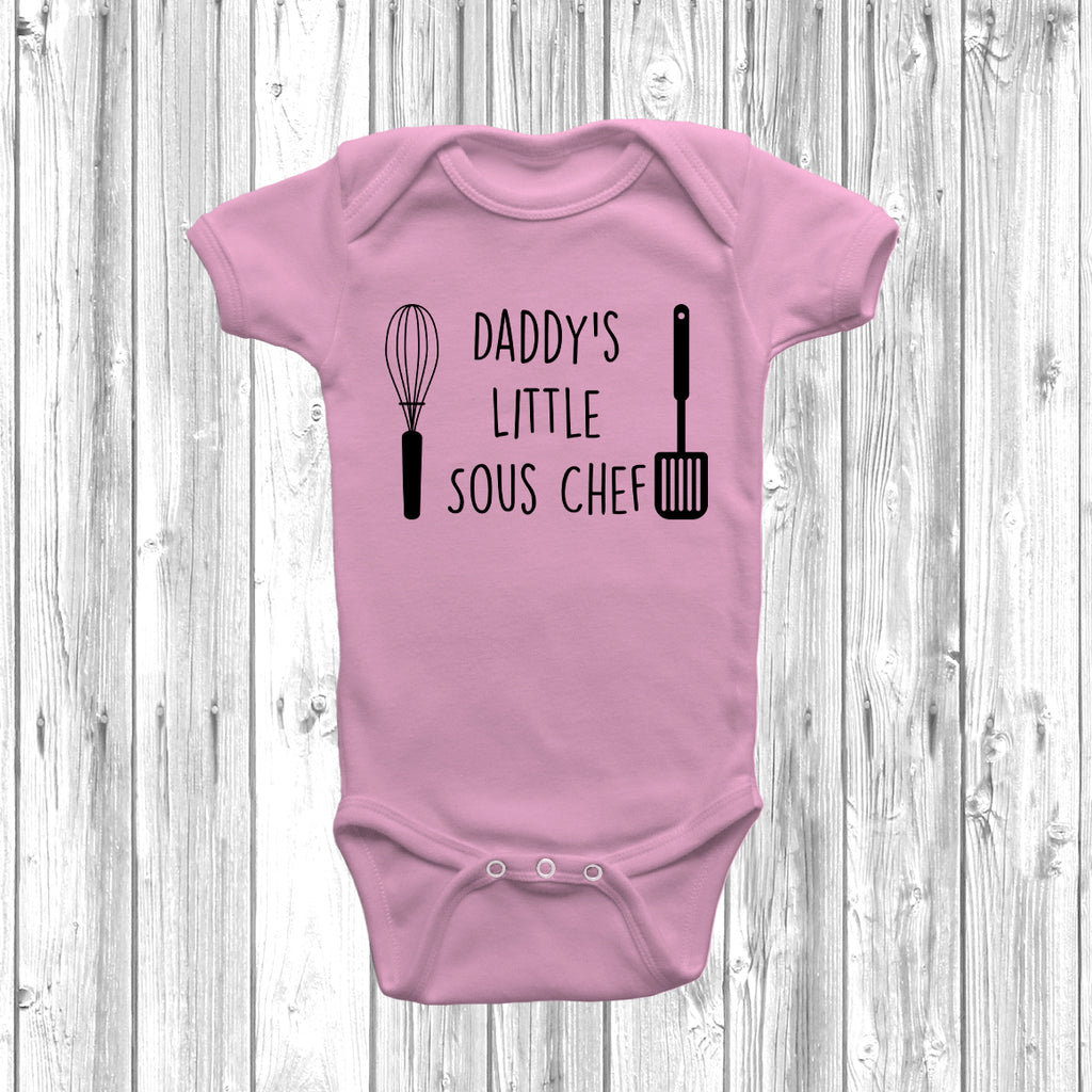 Close-up of Daddy’s Little Sous Chef baby grow print