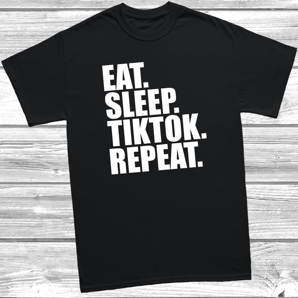 Get trendy with Eat Sleep Tiktok Repeat T-Shirt - T-Shirt available at DizzyKitten. Grab yours for £7.99 today!