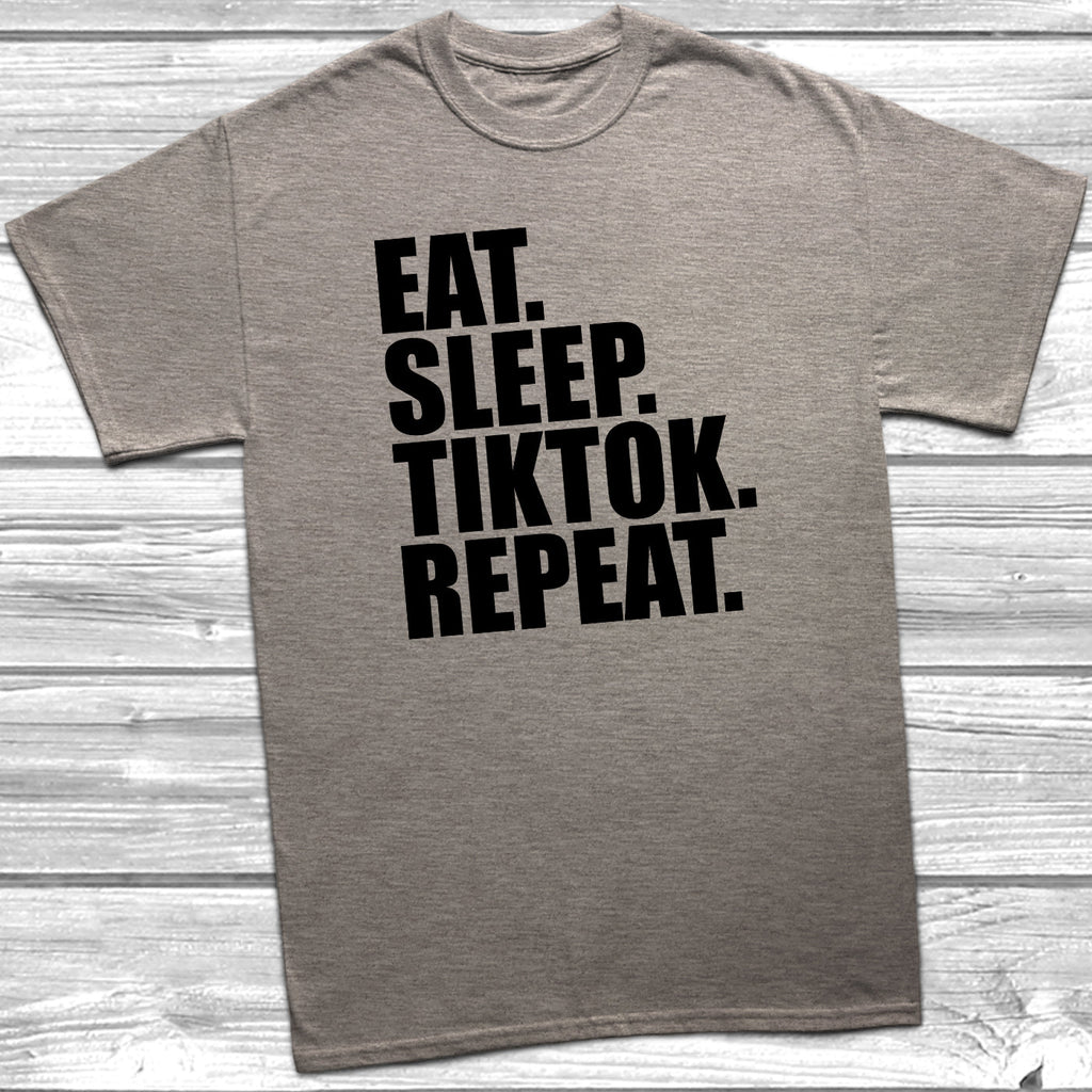 Get trendy with Eat Sleep Tiktok Repeat T-Shirt - T-Shirt available at DizzyKitten. Grab yours for £7.99 today!