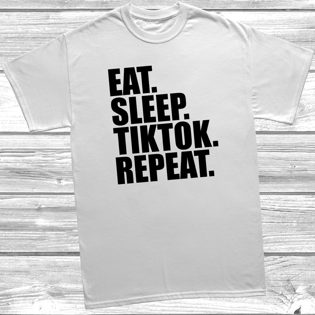 Get trendy with Eat Sleep Tiktok Repeat T-Shirt - T-Shirt available at DizzyKitten. Grab yours for £7.99 today!