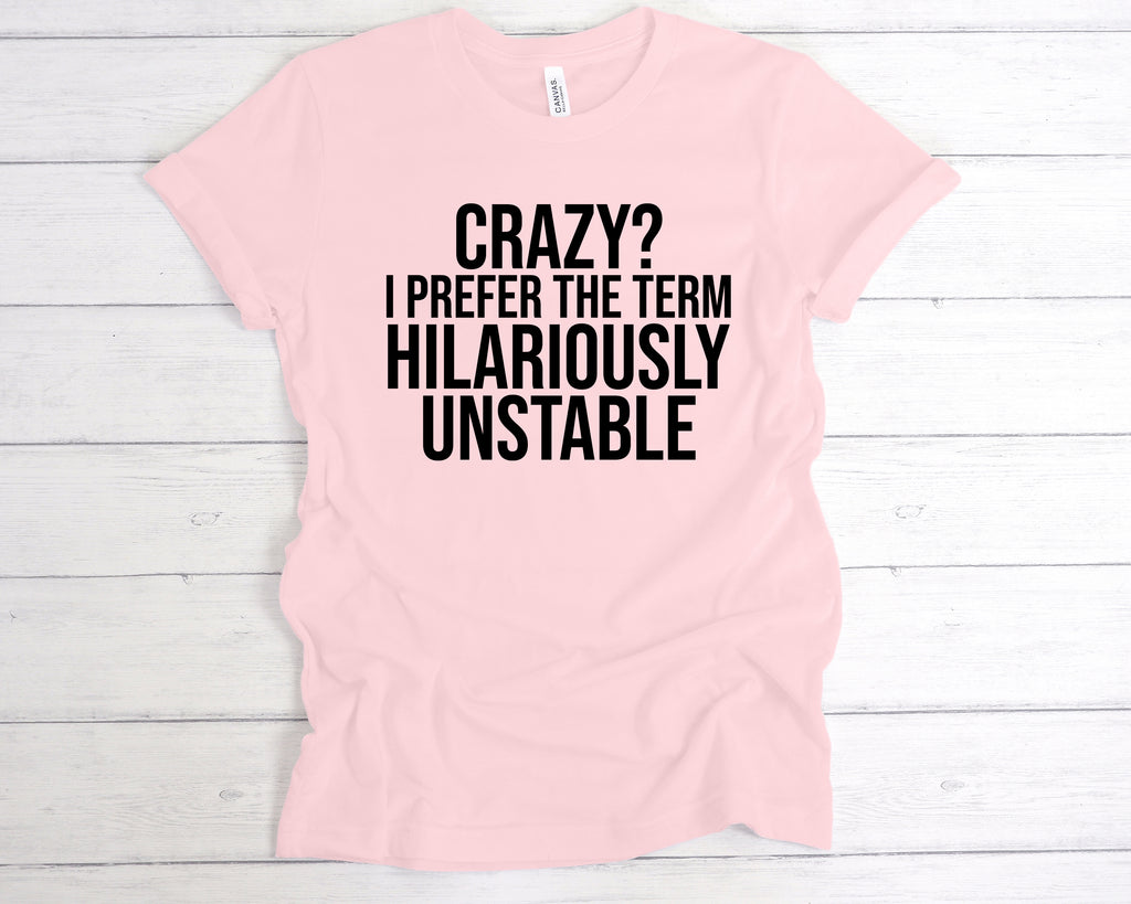 Soft Pink unisex t-shirt featuring the funny slogan "Crazy? I Prefer The Term Hilariously Unstable" printed in bold black lettering across the chest. This soft cotton humour shirt is perfect as a sarcastic gift, mental health awareness tee, or light-hearted statement piece. Designed for comfort and style, it’s ideal for anyone who embraces their wild side with pride. A great choice for fans of funny quote t-shirts, chaotic personality apparel, or quirky fashion.