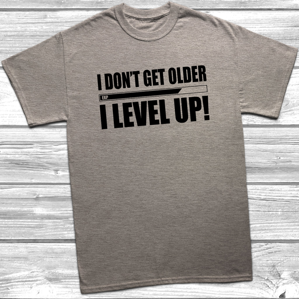 Get trendy with I Don't Get Older I Level Up T-Shirt - T-Shirt available at DizzyKitten. Grab yours for £9.49 today!