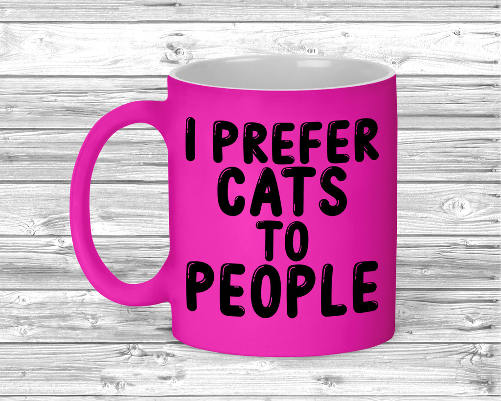 Close-up of printed slogan on colourful cat lover mug.