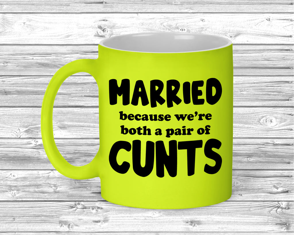 Novelty fluorescent mug with strong language slogan for married couples.