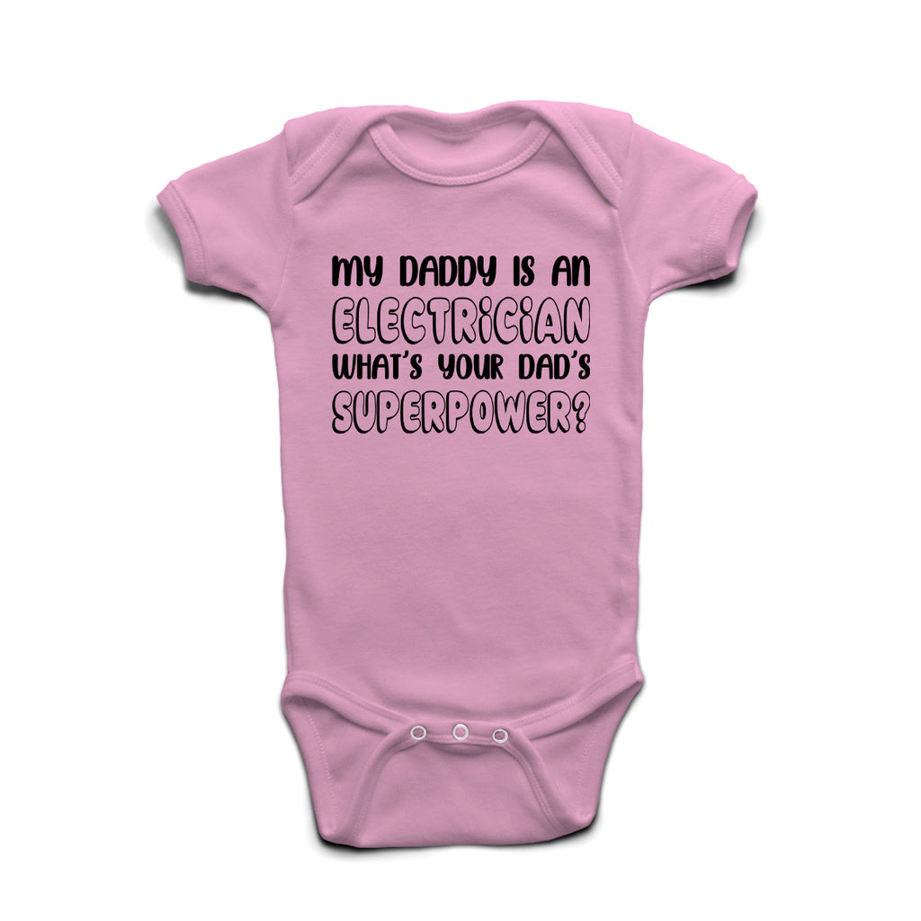 My Daddy Is An Electrician What’s Your Superpower baby grow in Pastel Pink cotton with bold print.