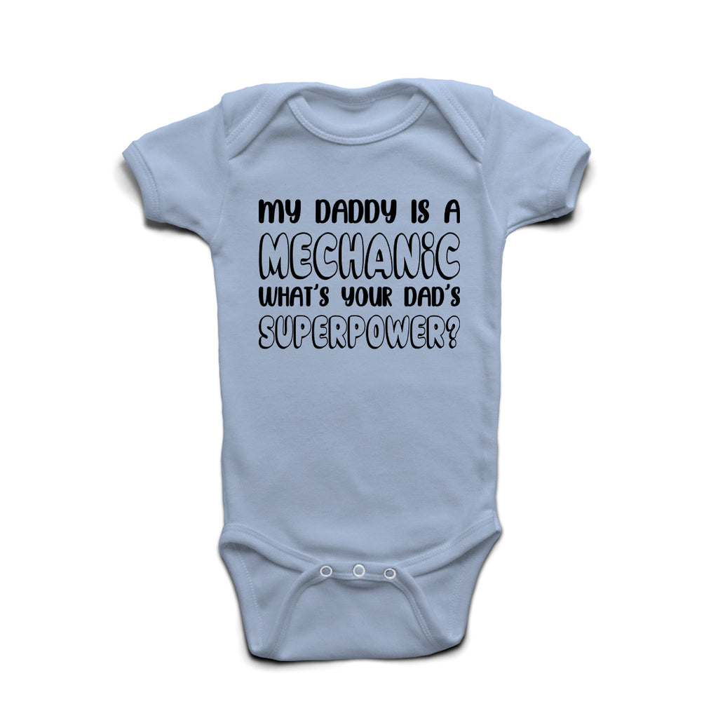 My Daddy Is A Mechanic  What’s Your Superpower baby grow in Pastel Blue cotton with bold print.