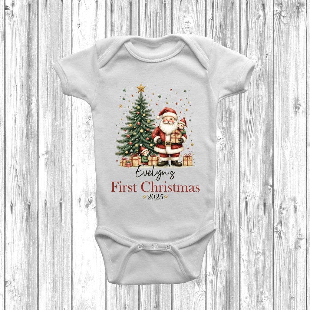 Customised First Christmas baby grow with name Evelyn in white – festive newborn outfit.
