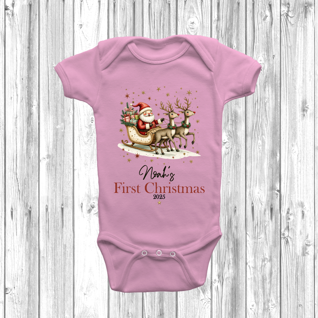 Custom First Christmas 2025 baby grow with Santa sleigh artwork, personalised with child’s name, perfect holiday keepsake.