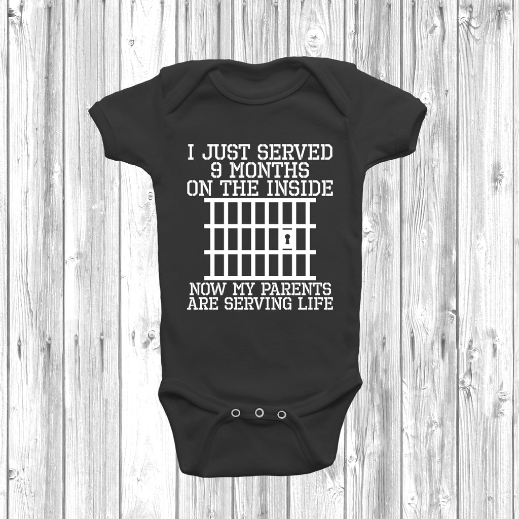 Black Funny baby grow with “Just Served 9 Months Inside” slogan in bold print, unisex design for newborn boys or girls.