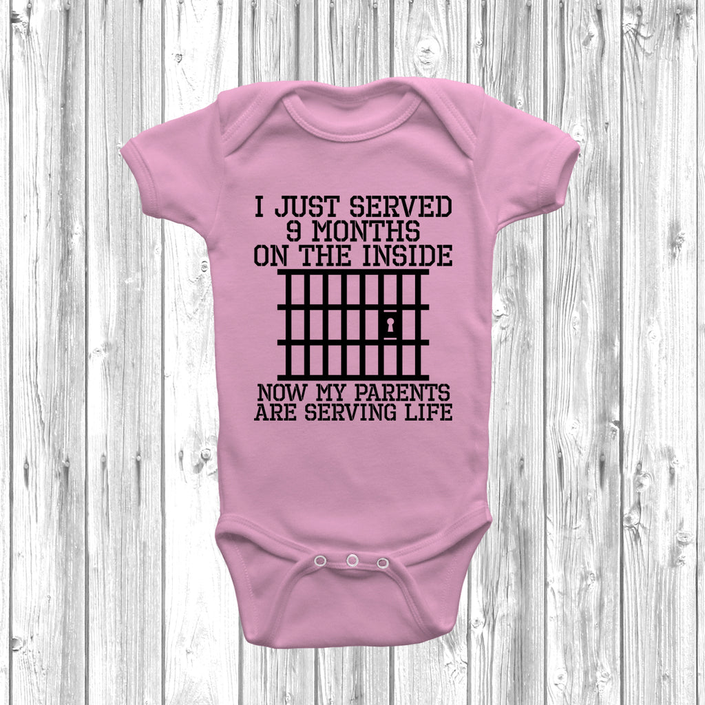 Pastel Pink Funny baby grow with “Just Served 9 Months Inside” slogan in bold print, unisex design for newborn boys or girls.