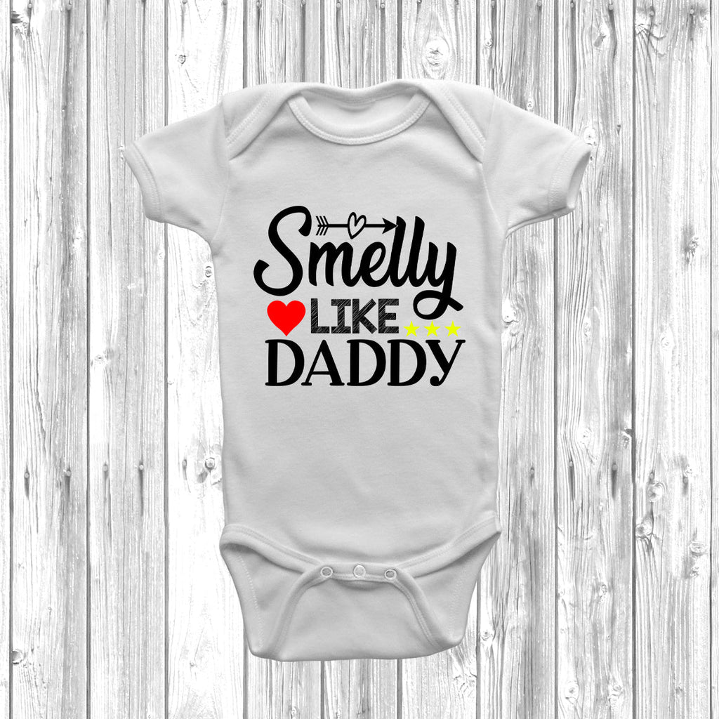 Get trendy with Smelly Like Daddy Baby Grow - Baby Grow available at DizzyKitten. Grab yours for £9.49 today!