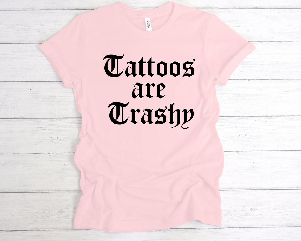 Pink t-shirt with 'Tattoos are Trashy' text