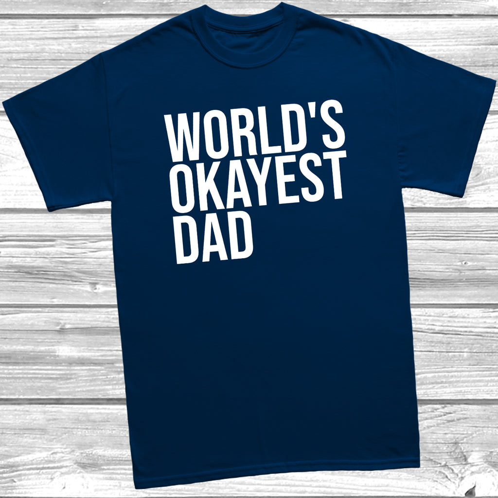 Deep Navy Father’s Day T-shirt laid flat with the quote “World’s Okayest Dad,” styled for casual everyday wear.