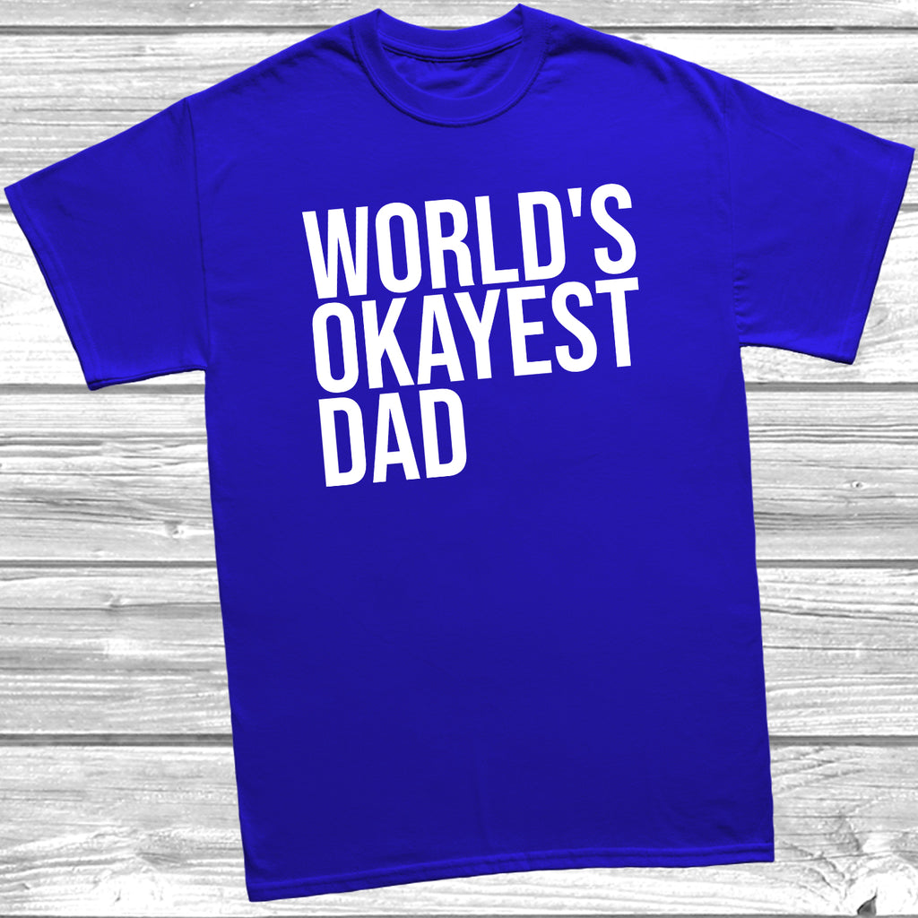 Royal Blue Father’s Day T-shirt laid flat with the quote “World’s Okayest Dad,” styled for casual everyday wear.