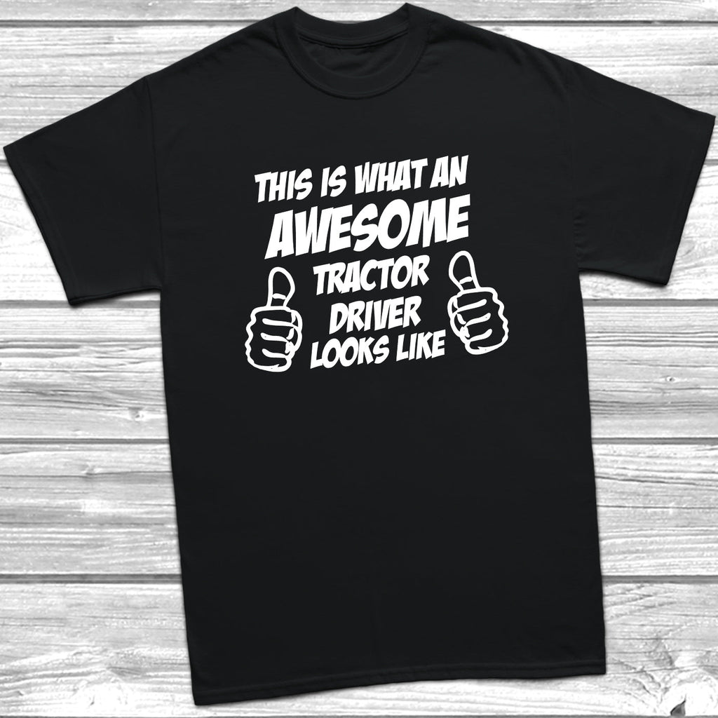 Get trendy with This Is What An Awesome Tractor Driver Looks Like T-Shirt - T-Shirt available at DizzyKitten. Grab yours for £9.49 today!