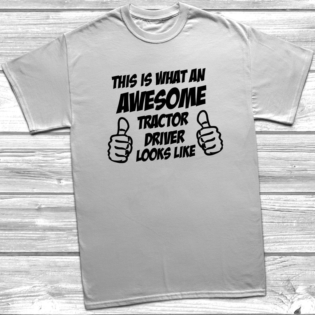 Get trendy with This Is What An Awesome Tractor Driver Looks Like T-Shirt - T-Shirt available at DizzyKitten. Grab yours for £9.49 today!