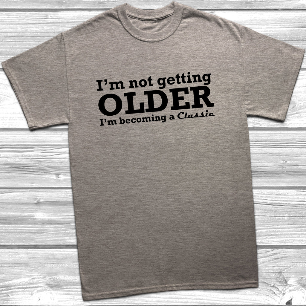 Get trendy with I'm Not Getting Older I'm Becoming A Classic T-Shirt - T-Shirt available at DizzyKitten. Grab yours for £8.99 today!