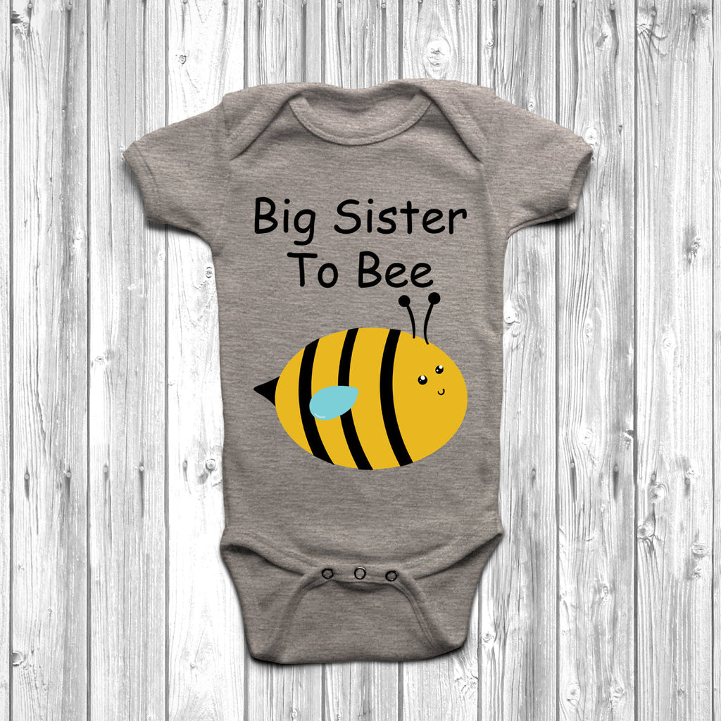 Get trendy with Big Sister To Bee Baby Grow - Baby Grow available at DizzyKitten. Grab yours for £7.95 today!