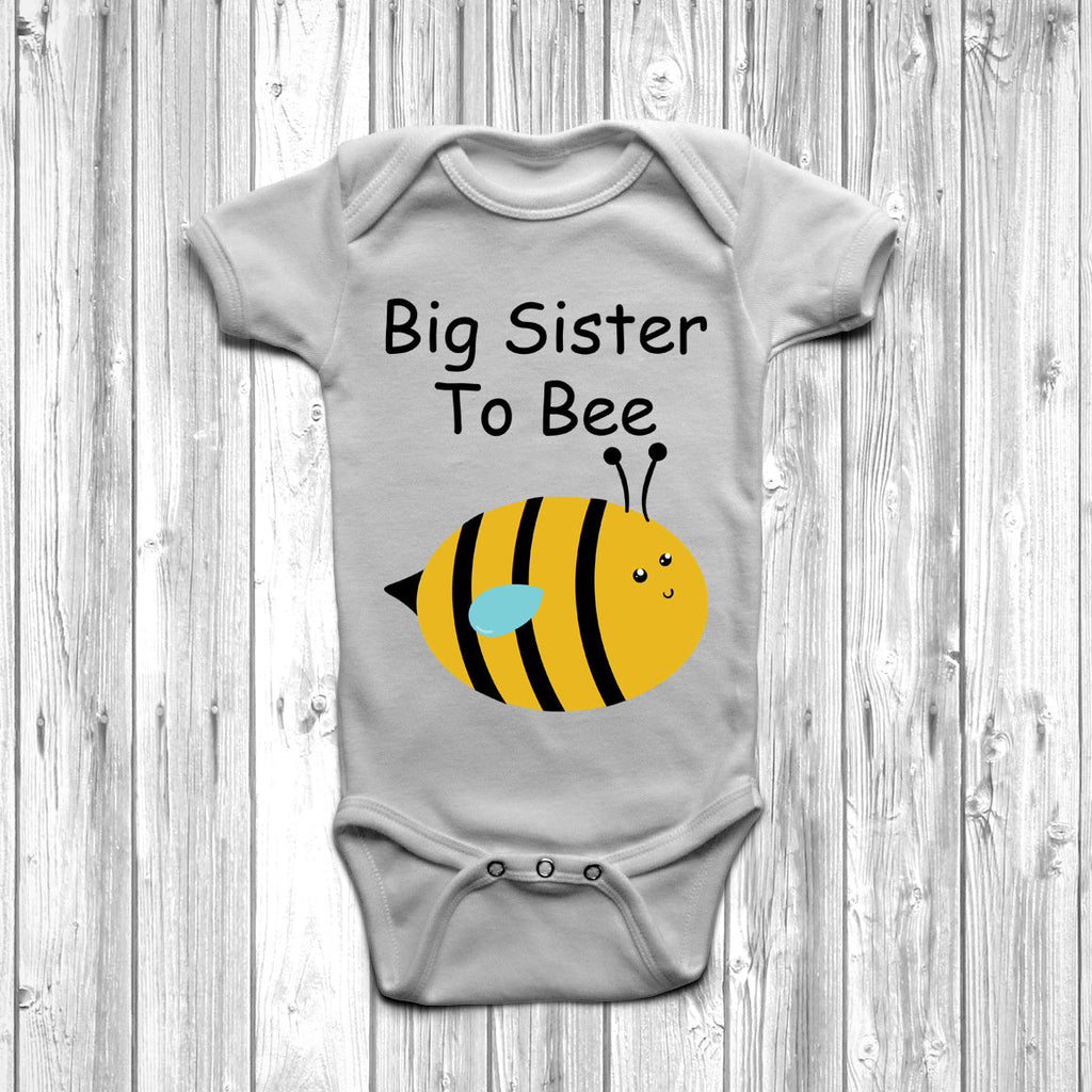 Get trendy with Big Sister To Bee Baby Grow - Baby Grow available at DizzyKitten. Grab yours for £7.95 today!