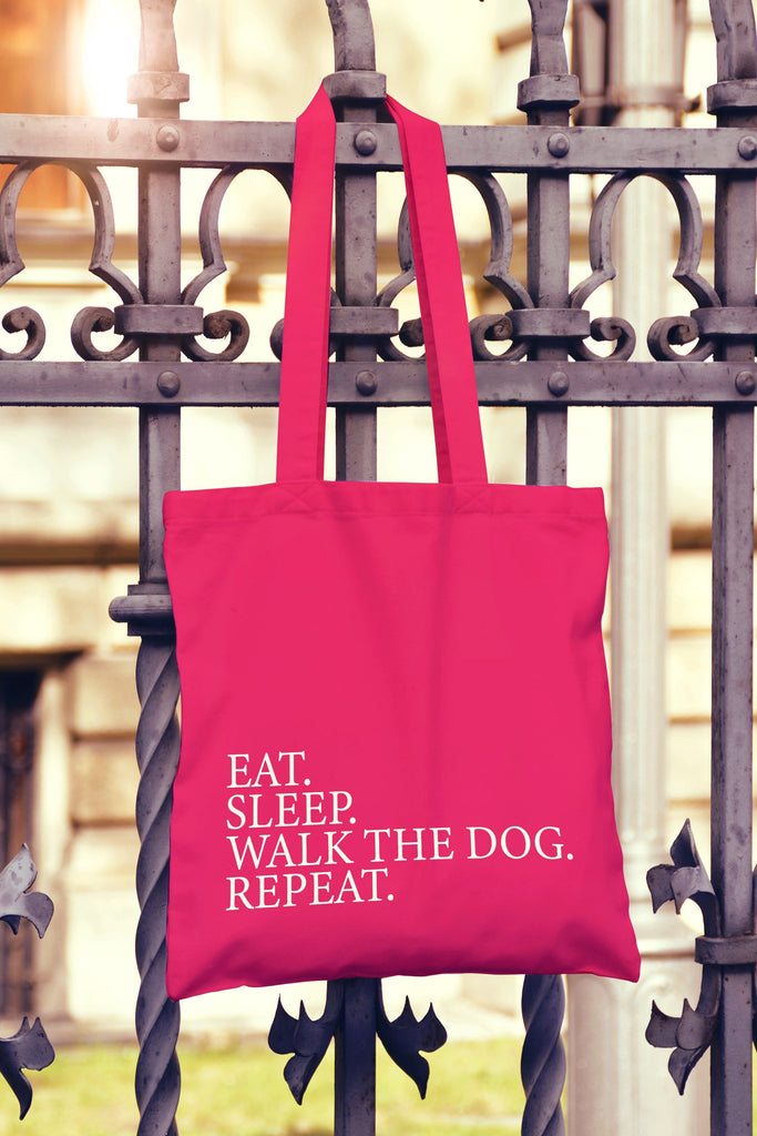 Get trendy with Eat Sleep Walk The Dog Repeat Tote Bag - Tote Bag available at DizzyKitten. Grab yours for £8.99 today!