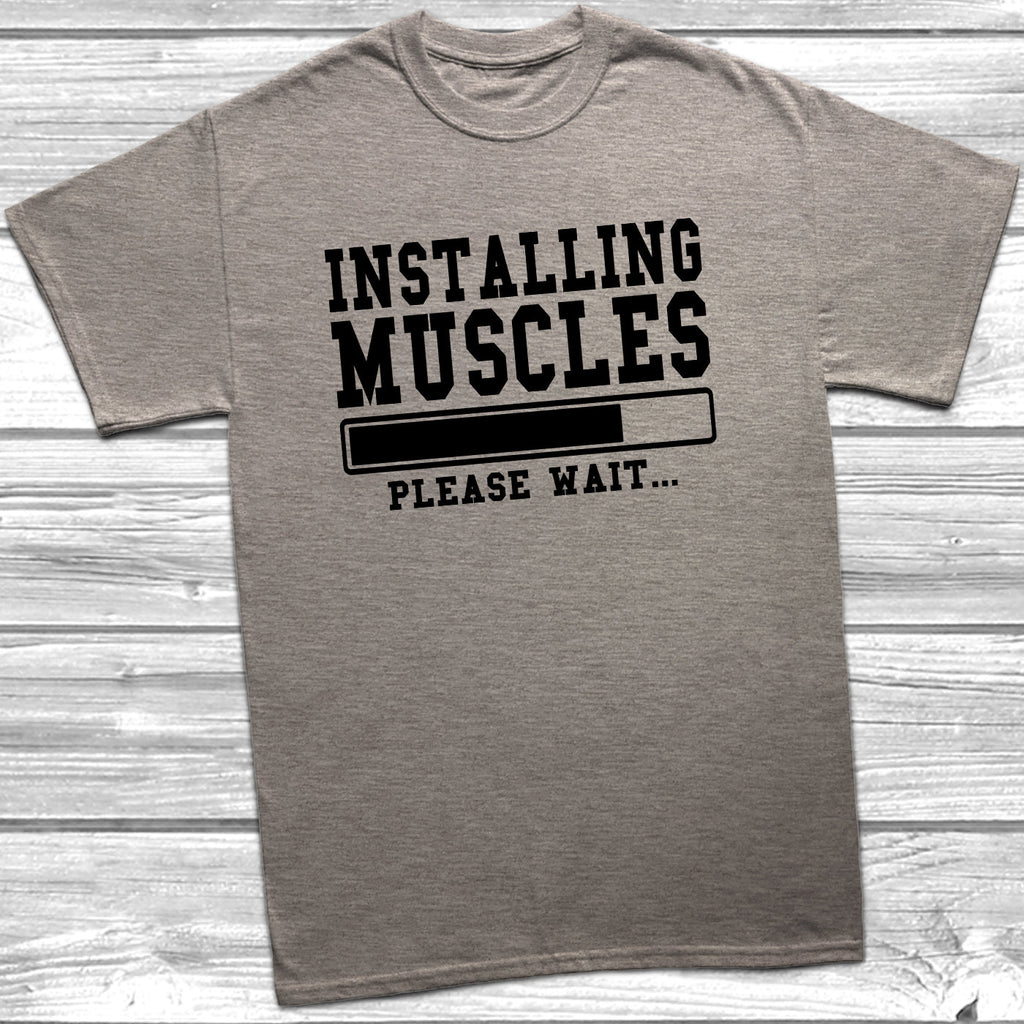 Get trendy with Installing Muscles T-Shirt - T-Shirt available at DizzyKitten. Grab yours for £8.99 today!