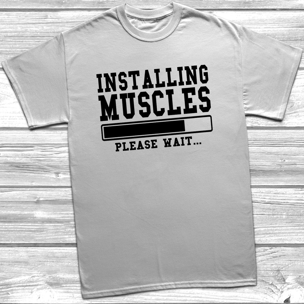 Get trendy with Installing Muscles T-Shirt - T-Shirt available at DizzyKitten. Grab yours for £8.99 today!