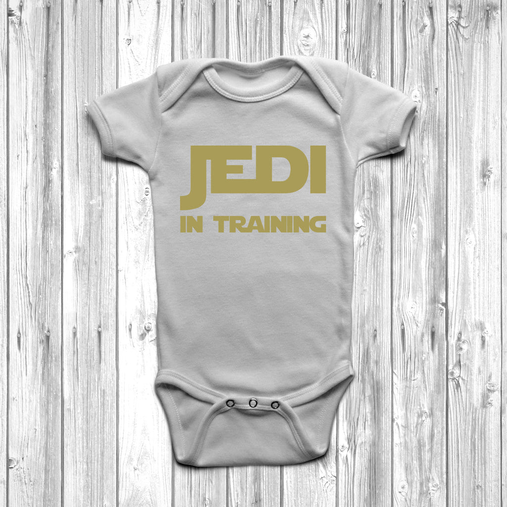 Get trendy with Jedi In Training Baby Grow - Baby Grow available at DizzyKitten. Grab yours for £8.45 today!