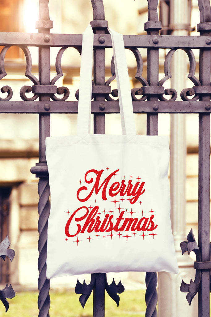 Get trendy with Merry Christmas Tote Bag - Tote Bag available at DizzyKitten. Grab yours for £6.99 today!