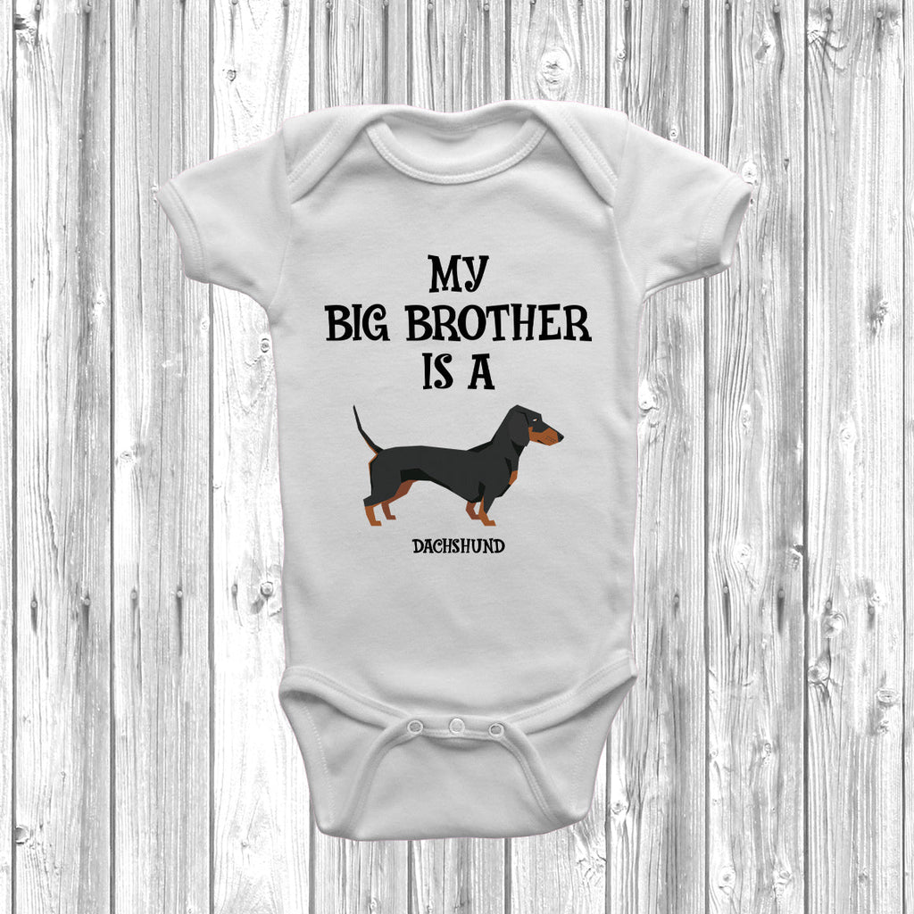 Get trendy with My Big Brother Is A Dachshund Baby Grow -  available at DizzyKitten. Grab yours for £8.95 today!