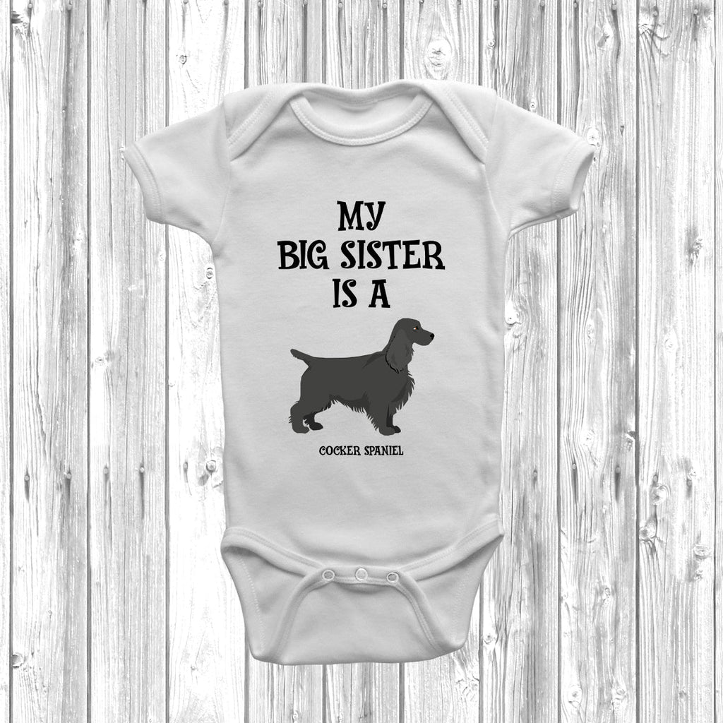 Get trendy with My Big Sister Is A Cocker Spaniel Baby Grow -  available at DizzyKitten. Grab yours for £8.95 today!