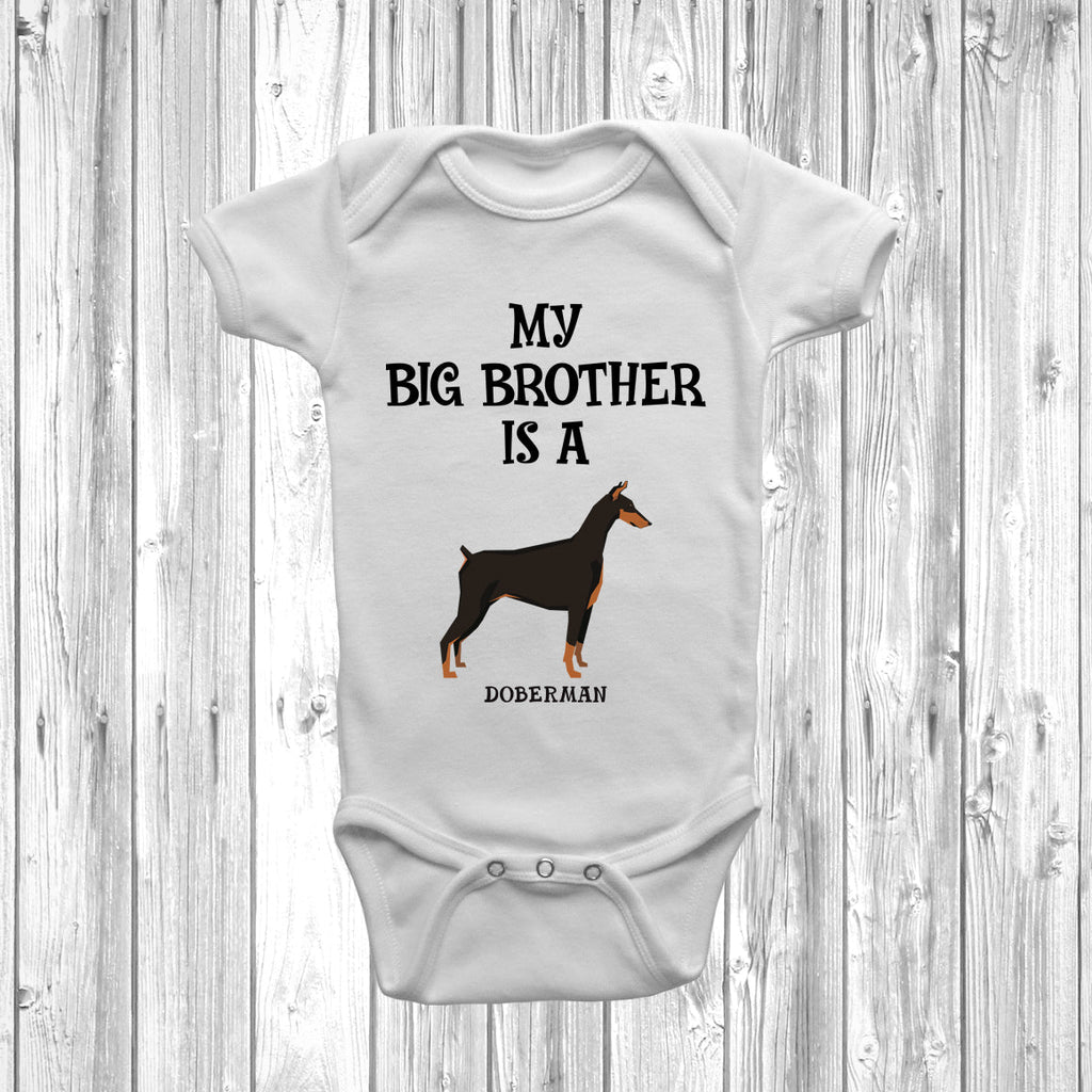 Get trendy with My Big Brother Is A Doberman Baby Grow -  available at DizzyKitten. Grab yours for £8.95 today!