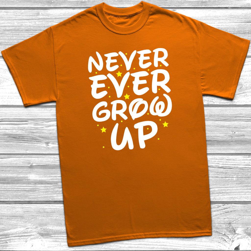 Get trendy with Never Ever Grow Up T-Shirt - T-Shirt available at DizzyKitten. Grab yours for £10.49 today!