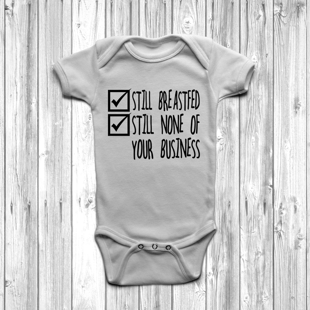 Get trendy with Still Breastfed Still None Of Your Business Baby Grow - Baby Grow available at DizzyKitten. Grab yours for £7.95 today!