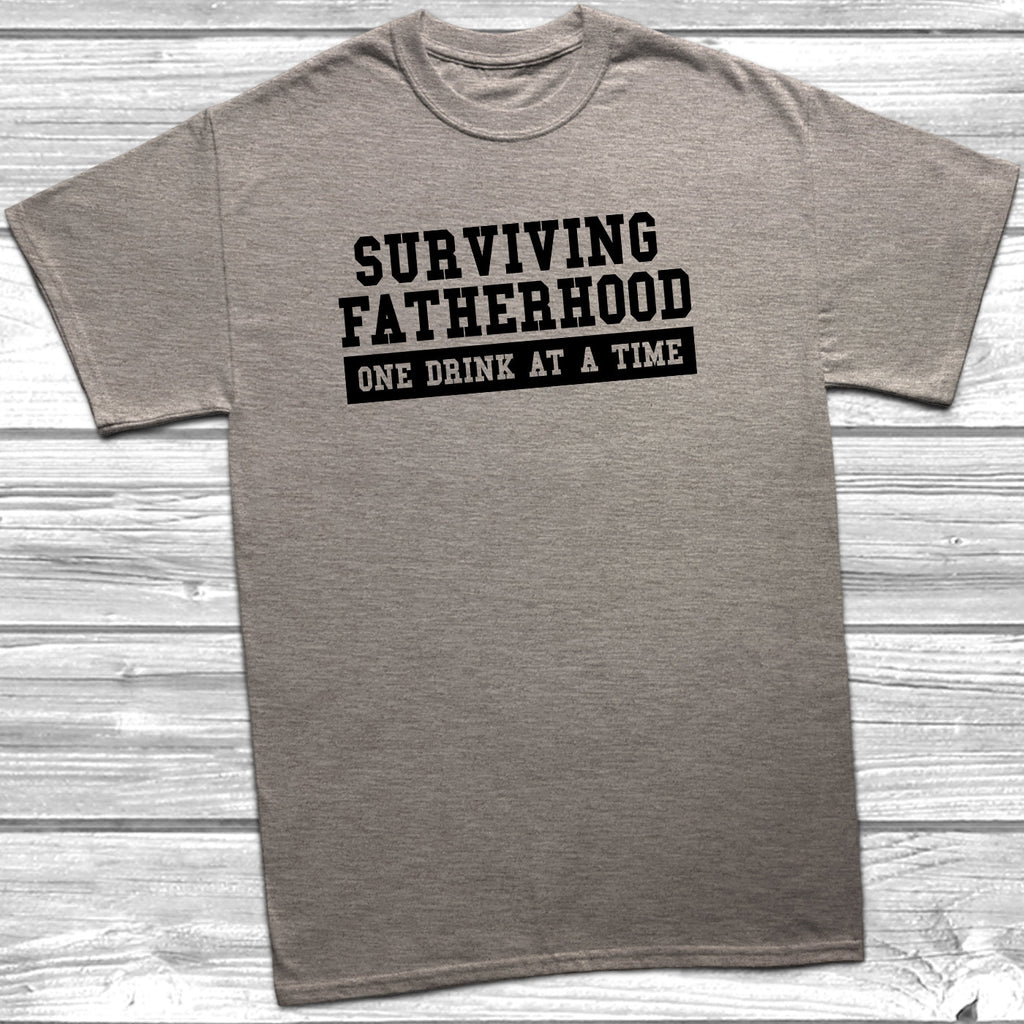 Get trendy with Surviving Fatherhood T-Shirt - T-Shirt available at DizzyKitten. Grab yours for £10.45 today!