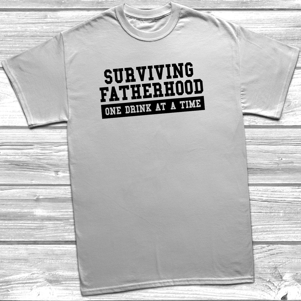 Get trendy with Surviving Fatherhood T-Shirt - T-Shirt available at DizzyKitten. Grab yours for £10.45 today!