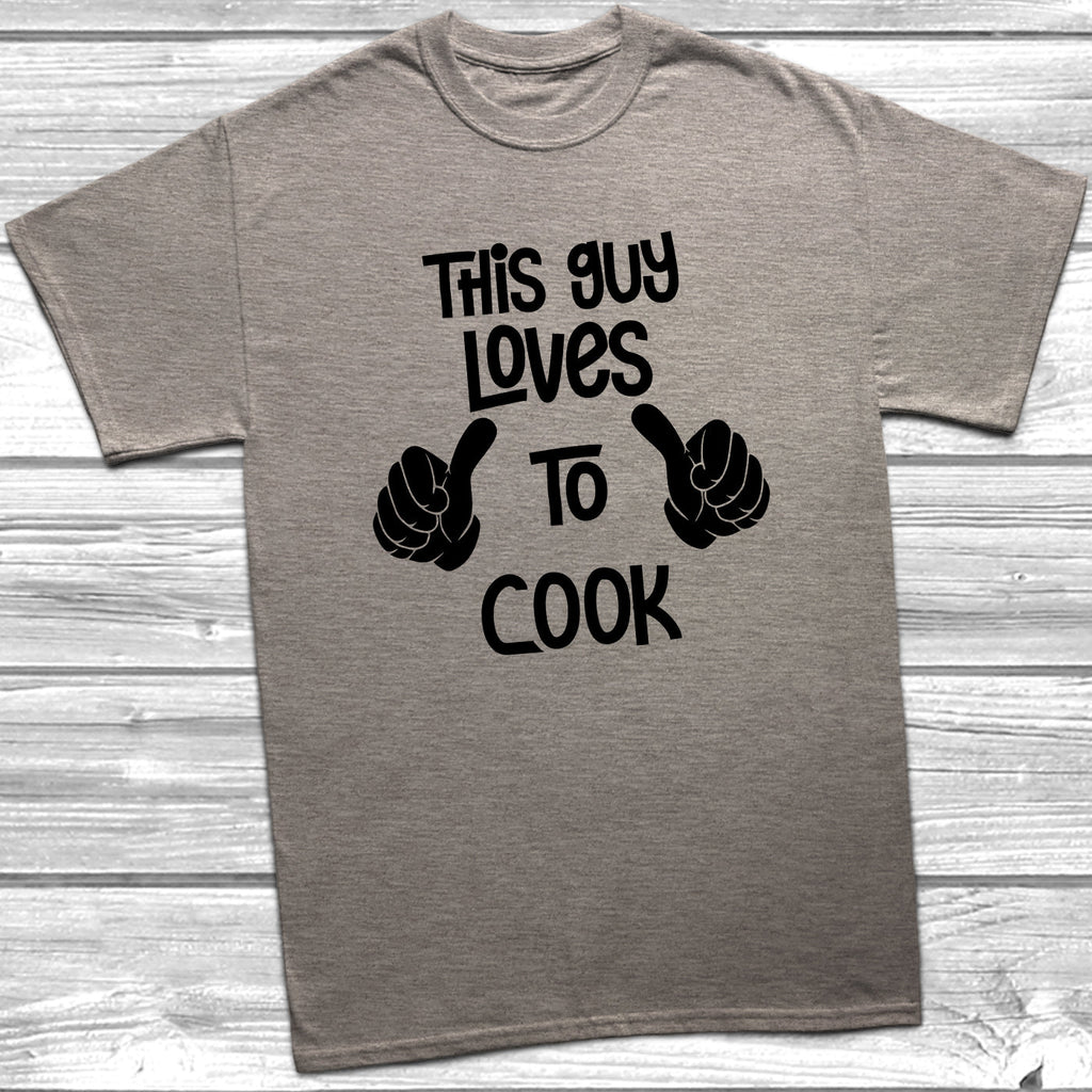 Get trendy with This Guy Loves To Cook T-Shirt - T-Shirt available at DizzyKitten. Grab yours for £9.99 today!