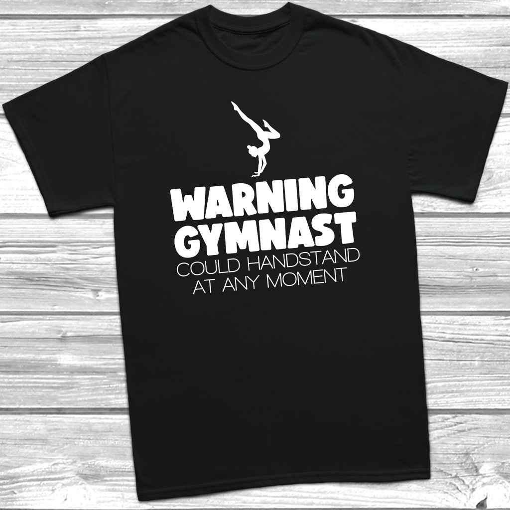 Get trendy with Warning Gymnast Could Handstand T-Shirt - T-Shirt available at DizzyKitten. Grab yours for £8.99 today!