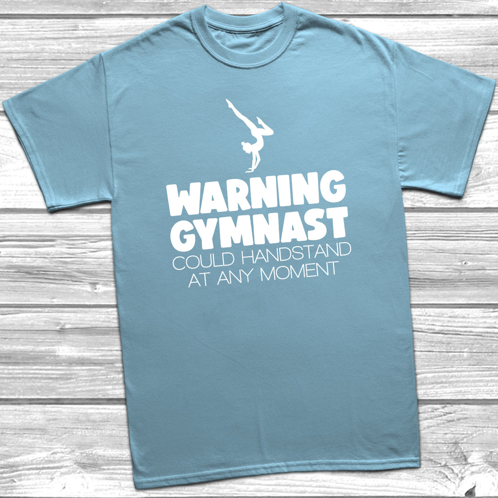 Get trendy with Warning Gymnast Could Handstand T-Shirt - T-Shirt available at DizzyKitten. Grab yours for £9.49 today!