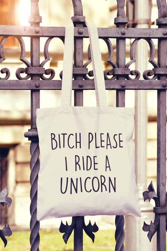 Get trendy with Bitch Please Ride A Unicorn Tote Bag - Tote Bag available at DizzyKitten. Grab yours for £7.49 today!