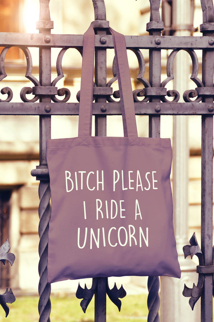 Get trendy with Bitch Please Ride A Unicorn Tote Bag - Tote Bag available at DizzyKitten. Grab yours for £7.49 today!