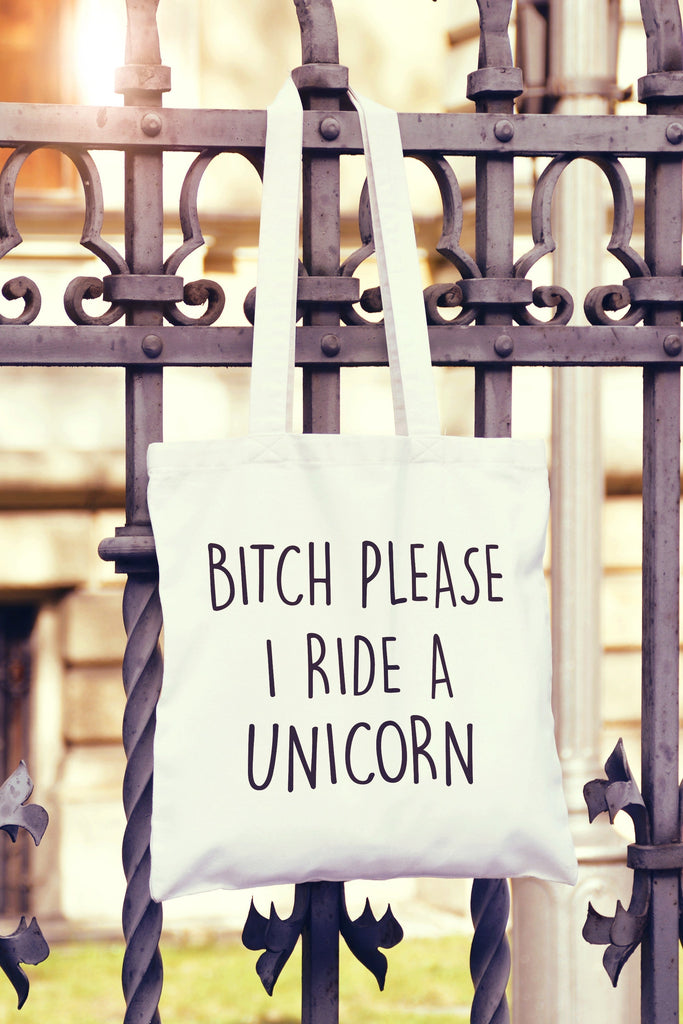 Get trendy with Bitch Please Ride A Unicorn Tote Bag - Tote Bag available at DizzyKitten. Grab yours for £7.49 today!