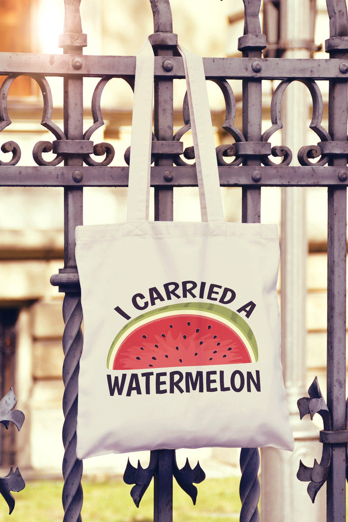 Get trendy with I Carried A Watermelon Tote Bag - Tote Bag available at DizzyKitten. Grab yours for £7.99 today!