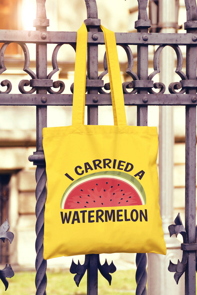 Get trendy with I Carried A Watermelon Tote Bag - Tote Bag available at DizzyKitten. Grab yours for £8.49 today!