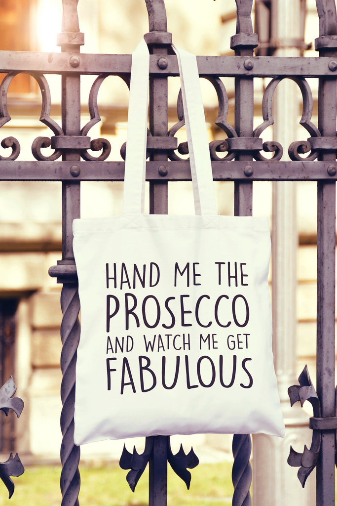 Get trendy with Hand Me The Prosecco And Watch Me Get Fabulous Tote Bag - Tote Bag available at DizzyKitten. Grab yours for £8.49 today!